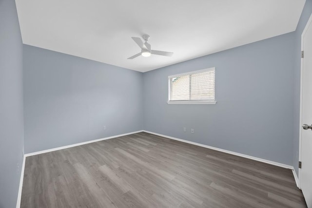 4411 Cumbria Ln, Austin, TX 78727 - unfurnished room featuring wood finished floors and ceiling fan
