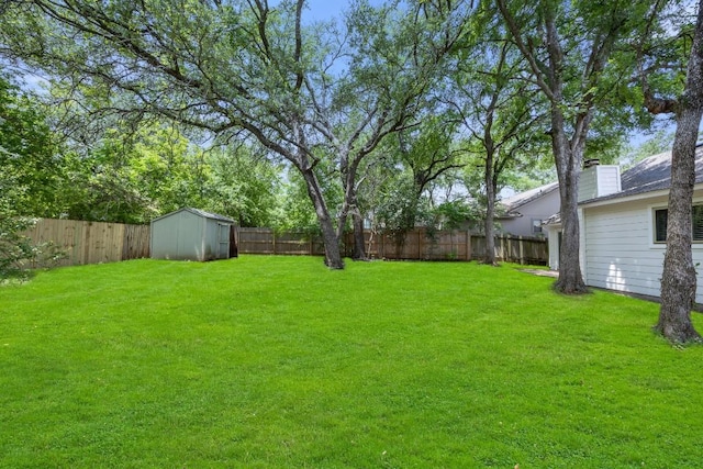 4411 Cumbria Ln, Austin, TX 78727 - fenced backyard with a storage unit