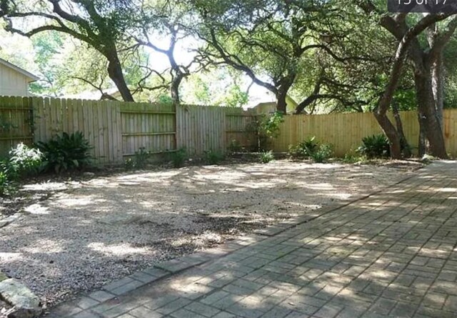exterior space with a fenced backyard