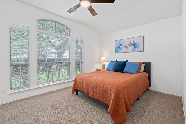14529 Wharton Park Trl, Austin, TX 78717 - carpeted bedroom featuring multiple windows, lofted ceiling, a ceiling fan, and baseboards