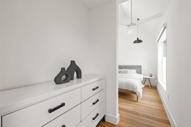 2700 E 12th St, Austin, TX 78702 - bedroom featuring light wood-style flooring and baseboards