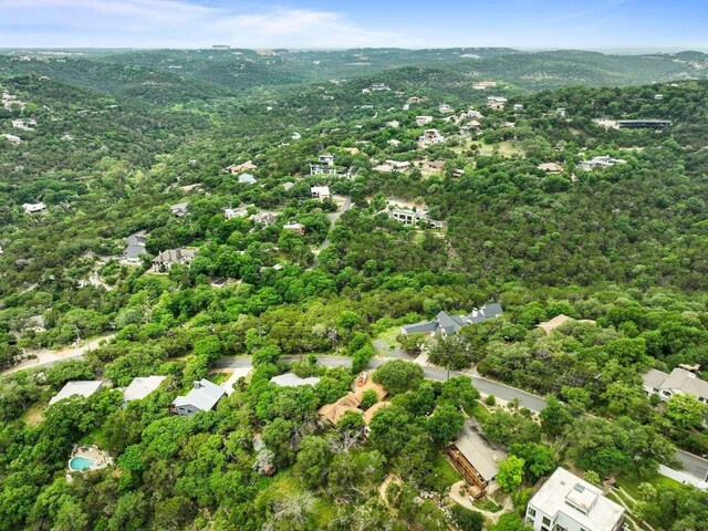 aerial view with a view of trees and a mountain view
