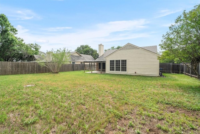 view of yard featuring a fenced backyard and a patio area
