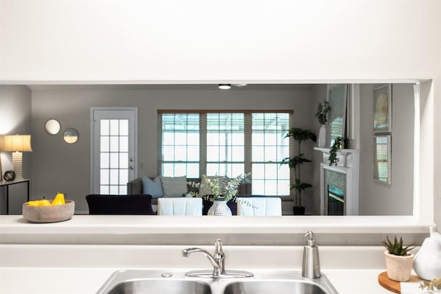 kitchen with light countertops and a sink