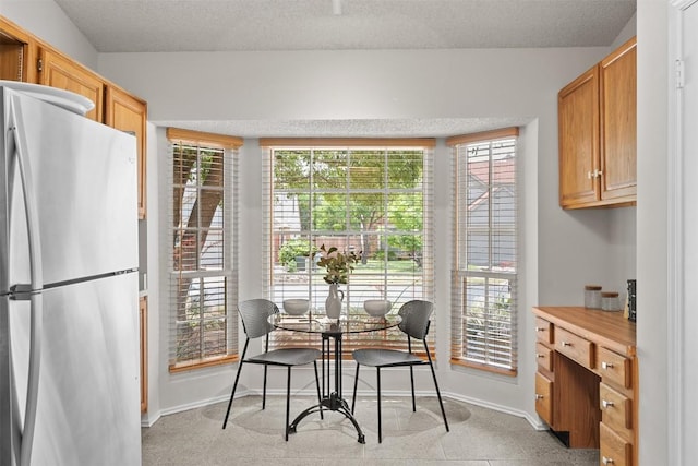 dining area with baseboards