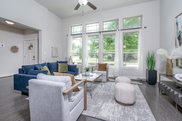 1766 Rowdy Loop, Leander, TX 78641 - living room featuring baseboards, ceiling fan, and wood finished floors