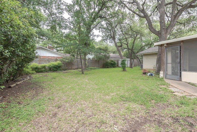 view of yard featuring fence