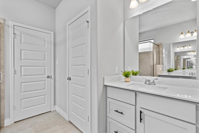 120 Freeman Loop, Liberty Hill, TX 78642 - full bathroom featuring a stall shower, vanity, and tile patterned floors