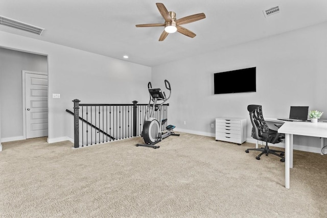 office with carpet floors, ceiling fan, and visible vents