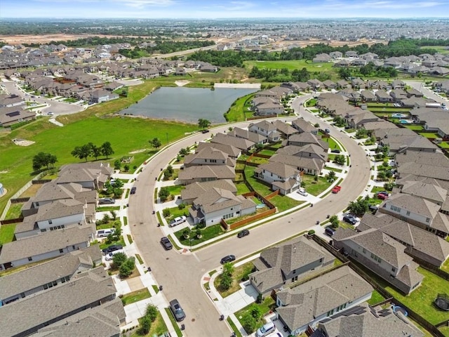 aerial view with a residential view and a water view