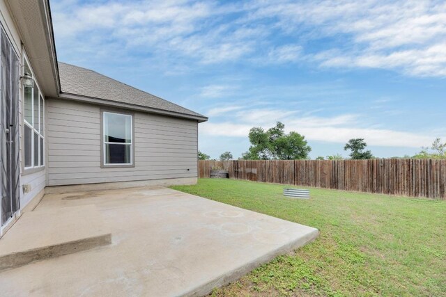 exterior space featuring a patio and a fenced backyard