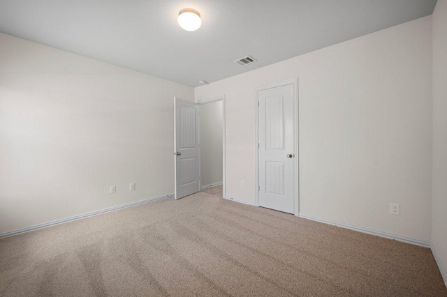 1364 Star Mdw, Kyle, TX 78640 - unfurnished bedroom featuring carpet and baseboards