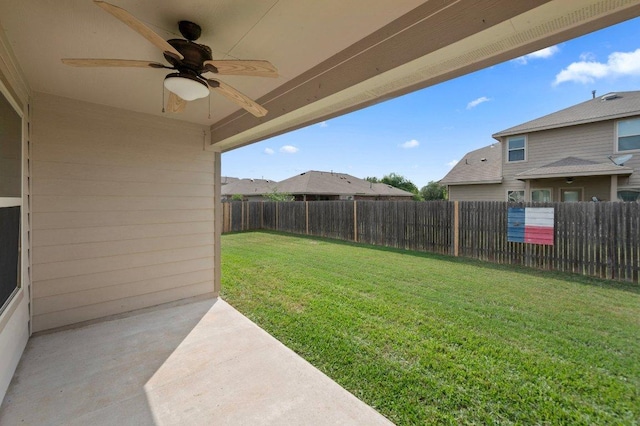 1364 Star Mdw, Kyle, TX 78640 - fenced backyard featuring a ceiling fan and a patio