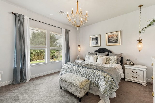 carpeted bedroom with a notable chandelier, visible vents, and baseboards