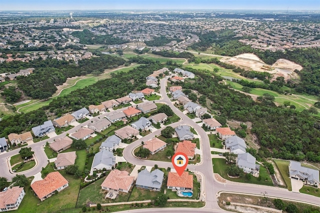 birds eye view of property with a residential view