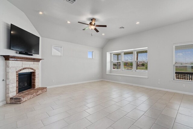 8105 Porto Cv, Round Rock, TX 78665 - unfurnished living room with vaulted ceiling, a ceiling fan, recessed lighting, tile patterned flooring, and a fireplace