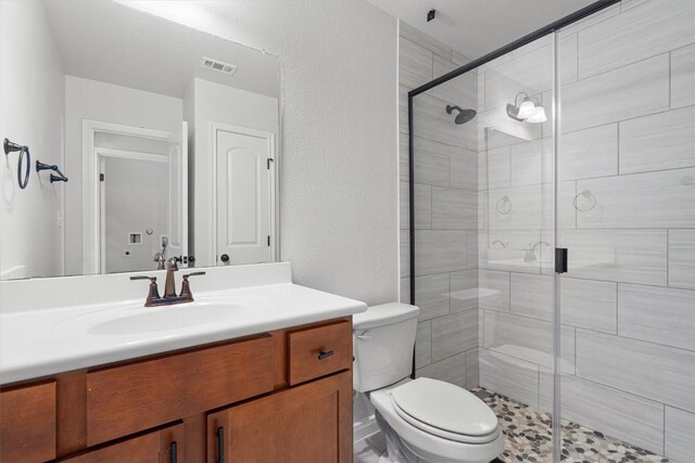 8105 Porto Cv, Round Rock, TX 78665 - bathroom featuring vanity and a shower stall