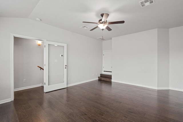 empty room featuring baseboards, ceiling fan, wood finished floors, and visible vents