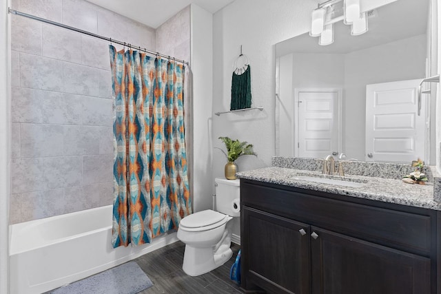 bathroom featuring toilet, shower / bath combination with curtain, wood finished floors, and vanity
