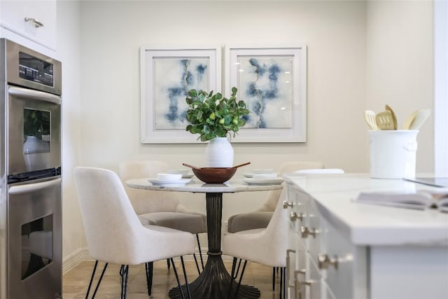 40 N Interstate 35 Unit 10B1, Austin, TX 78701 - dining area featuring baseboards