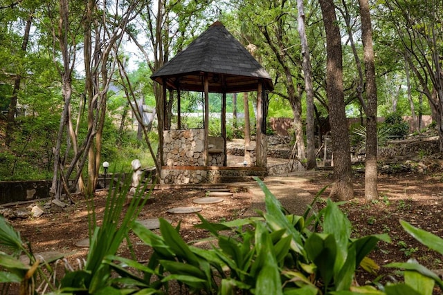 view of yard with a gazebo and fence