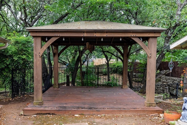 exterior space with a gazebo and a fenced backyard