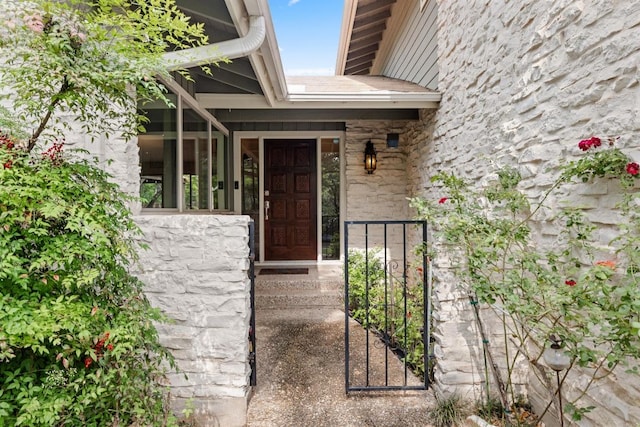 7504 Creekbluff Dr, Austin, TX 78750 - property entrance with stone siding