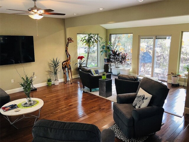 7504 Creekbluff Dr, Austin, TX 78750 - living room with healthy amount of natural light, ceiling fan, hardwood / wood-style floors, and recessed lighting