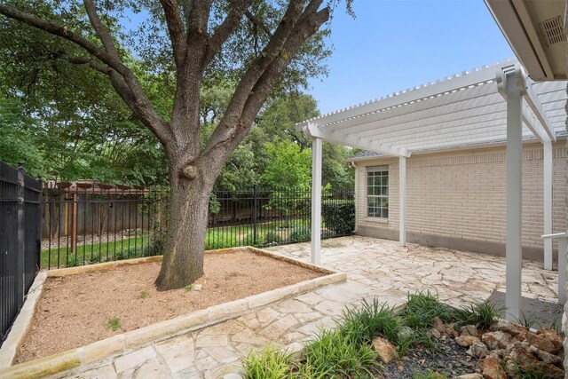 view of yard with a pergola, fence private yard, and a patio area