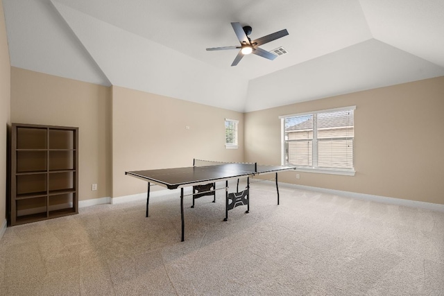 game room featuring baseboards, a ceiling fan, carpet, and lofted ceiling