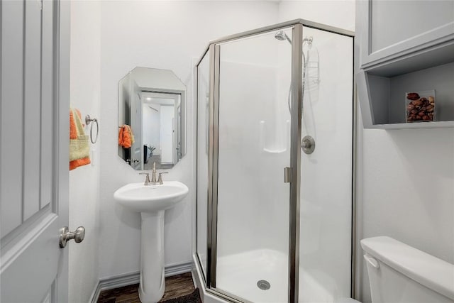 4118 Cripple Creek Dr, Temple, TX 76502 - full bath featuring toilet, a stall shower, a sink, and wood finished floors