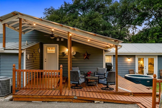 120 Highland Ln, Kingsland, TX 78639 - deck with a hot tub, french doors, and an outdoor living space