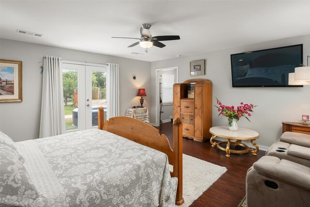 bedroom featuring visible vents, access to exterior, french doors, a ceiling fan, and dark wood finished floors