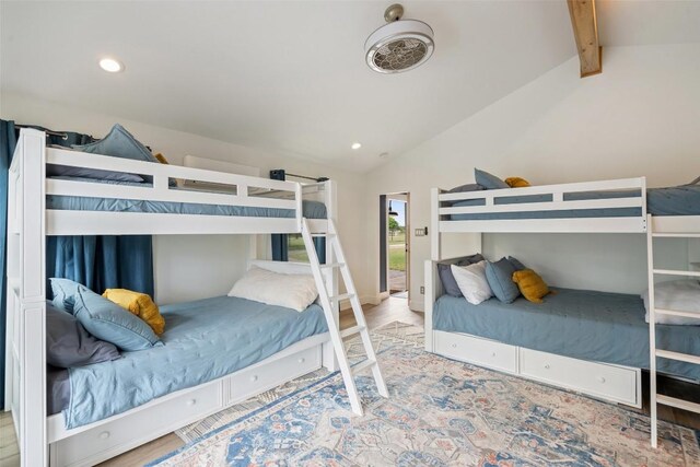 bedroom featuring recessed lighting, vaulted ceiling with beams, and wood finished floors