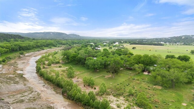 drone / aerial view with a mountain view and a rural view