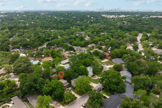 birds eye view of property with a residential view