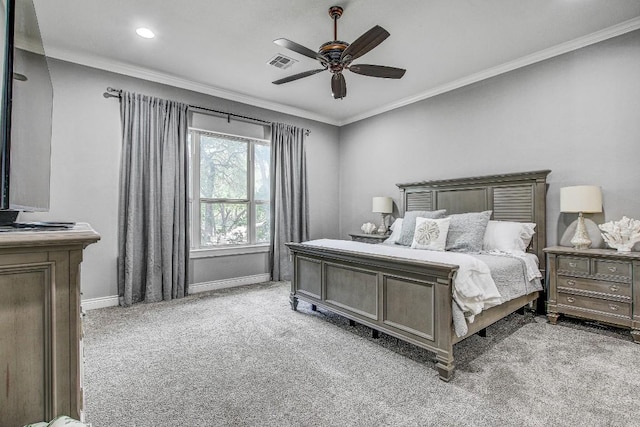 bedroom with visible vents, ornamental molding, baseboards, and light colored carpet