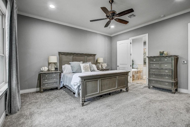 bedroom with carpet floors, crown molding, visible vents, and baseboards