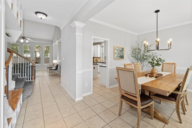 dining area with stairway, light tile patterned floors, ornamental molding, and ornate columns