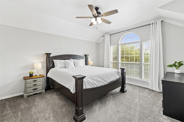 bedroom with carpet flooring, baseboards, vaulted ceiling, and ceiling fan