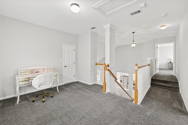 carpeted office space featuring visible vents, attic access, and baseboards
