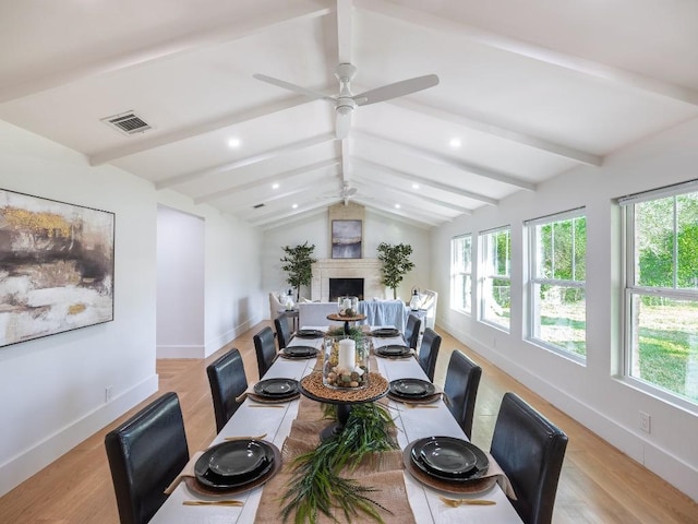 5203 Branding Chase St, Austin, TX 78727 - dining room featuring baseboards, lofted ceiling with beams, and plenty of natural light