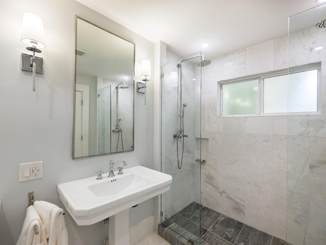 full bath with visible vents and a walk in shower