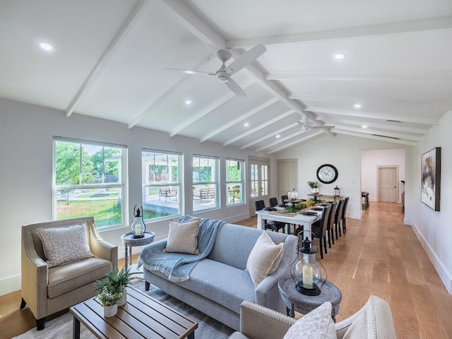 5203 Branding Chase St, Austin, TX 78727 - living room with ceiling fan, lofted ceiling with beams, a healthy amount of sunlight, and light wood-type flooring