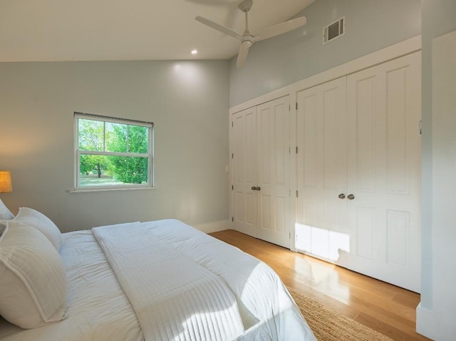5203 Branding Chase St, Austin, TX 78727 - bedroom with visible vents, light wood finished floors, two closets, and radiator