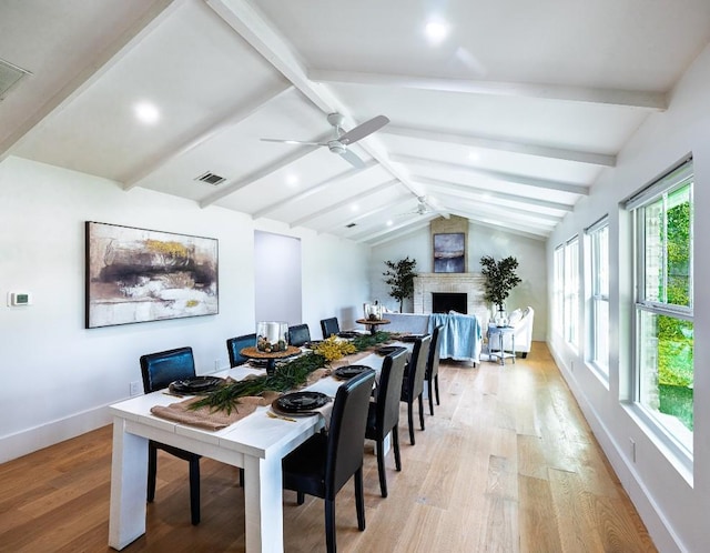 5203 Branding Chase St, Austin, TX 78727 - dining space with visible vents, baseboards, ceiling fan, vaulted ceiling with beams, and light wood-type flooring