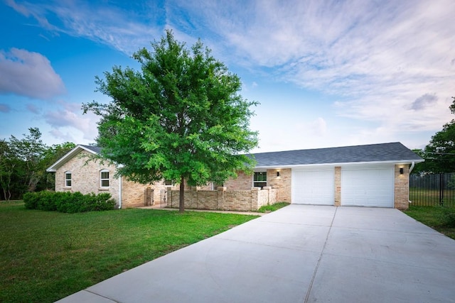 5203 Branding Chase St, Austin, TX 78727 - ranch-style house with fence, a front lawn, brick siding, a garage, and driveway