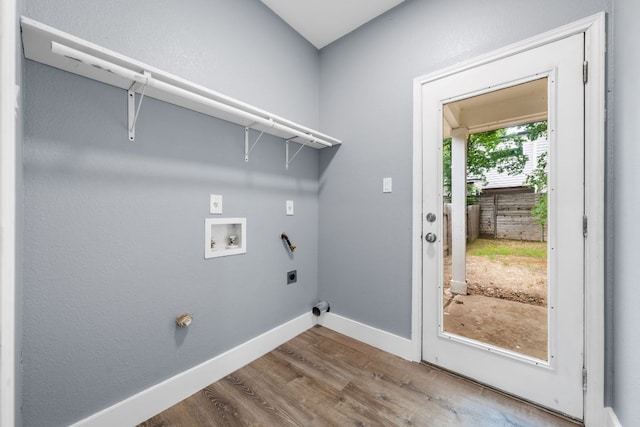 1214 Vargas Rd Unit B, Austin, TX 78741 - washroom with electric dryer hookup, washer hookup, and wood finished floors