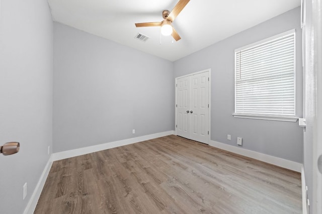 1214 Vargas Rd Unit B, Austin, TX 78741 - spare room with ceiling fan and wood finished floors