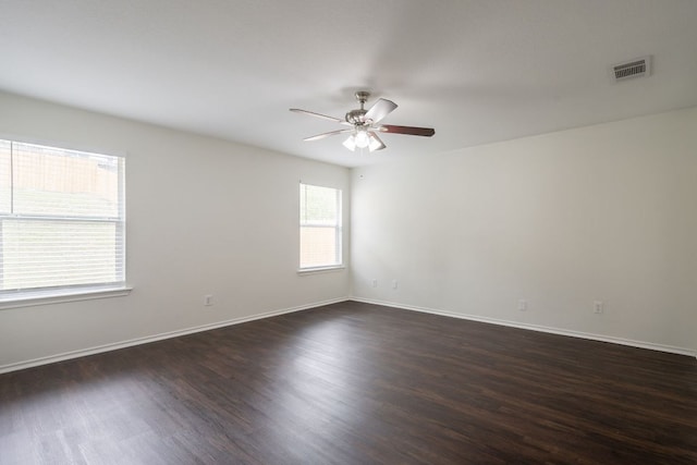 292 Dandelion Loop, Kyle, TX 78640 - unfurnished room with a ceiling fan, dark wood finished floors, and baseboards